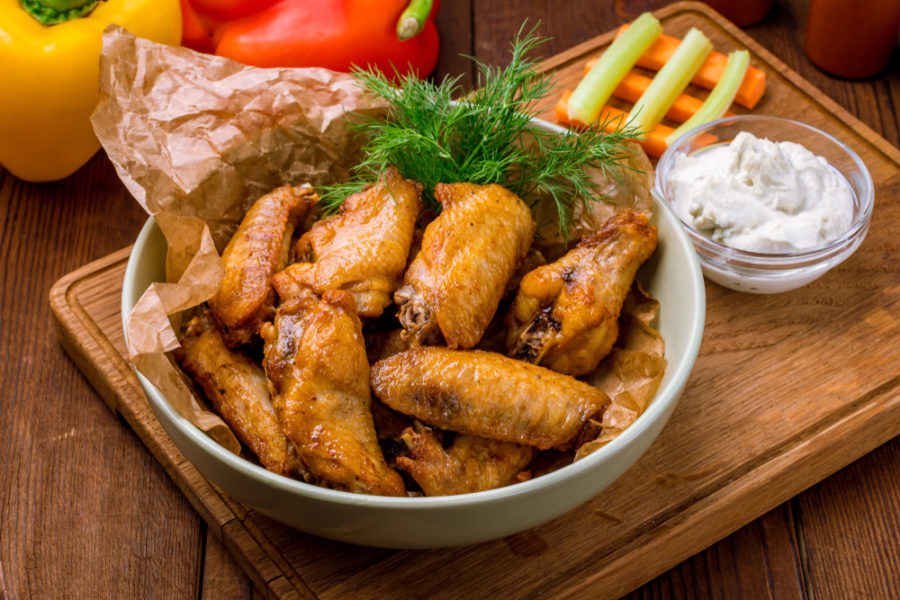Traditional hot wings in a bowl