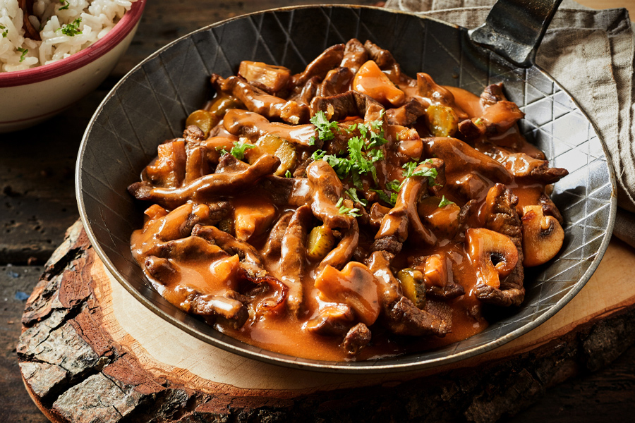 Brisket & mushrooms in a saucepan