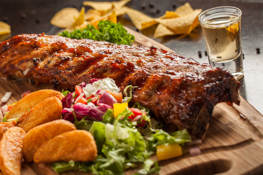 Rack Of Ribs On Wooden Cutting Board